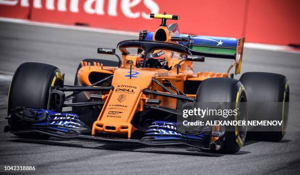 McLaren's Belgian driver Stoffel Vandoorne steers his car during the first practice session of the Formula One Russian Grand Prix at the Sochi...