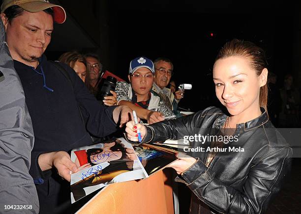 Actress Danielle Harris signs autographs at the "Stake Land" Premiere during the 35th Toronto International Film Festival at Ryerson Theatre on...