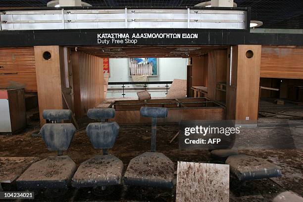 Bird droppings cover seats in the departure lounge inside the old Nicosia airport terminal building, now located within the UN-controlled buffer zone...