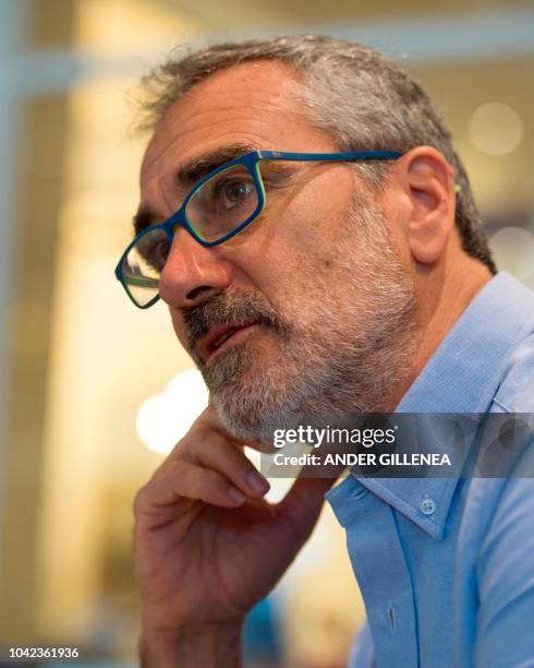 Spanish director Javier Fesser poses during an AFP interview on his film "Campeones" during the 66th San Sebastian Film Festival, in the northern...