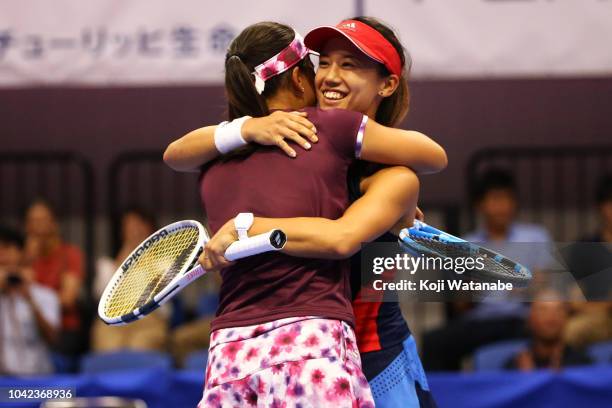 Doubles champion Makoto Ninomiya and Miyu Kato of Japan celebrate after the Doubles final against Barbora Strycova and Andrea Sestini Hlavackova of...