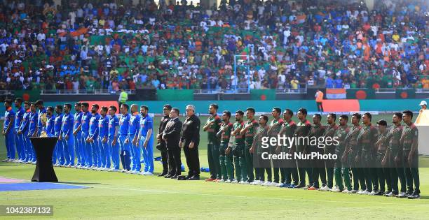 Indian cricket captain Rohit Sharma and Bangladesh cricket captain Mashrafe Mortaza and their team members sing the national anthems during the final...
