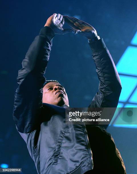 Singer Jay Z performs onstage during a concert of his 'Magna Carter World Tour' at O2 World in Hamburg, Germany, 27 October 2013. Jay Z will give two...