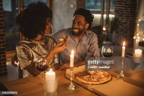 romantic pizza evening at home - evening meal stock pictures, royalty-free photos & images