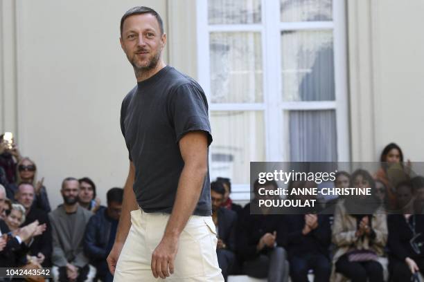 Belgian fashion designer Cedric Charlier acknowledges the audience at the end of the Cedric Charlier Spring-Summer 2019 Ready-to-Wear collection...