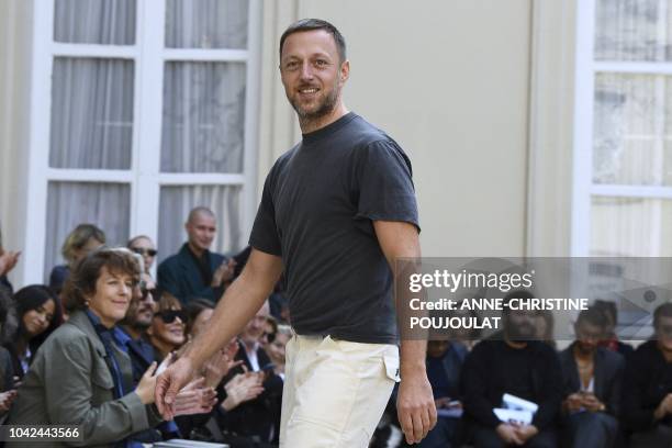 Belgian fashion designer Cedric Charlier acknowledges the audience at the end of the Cedric Charlier Spring-Summer 2019 Ready-to-Wear collection...