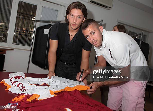 Belstaff's Michele Malenotti and AS Roma's football player Jeremy Menez attend the Belstaff Official Meeting with AS Roma football team at the AS...