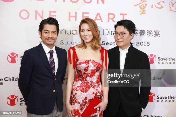 Actor Aaron Kwok Fu-shing, actress/model Cathy Tsui Lee and his husband businessman Martin Lee Ka-shing attend 'Save the Children' Annual Gala Dinner...