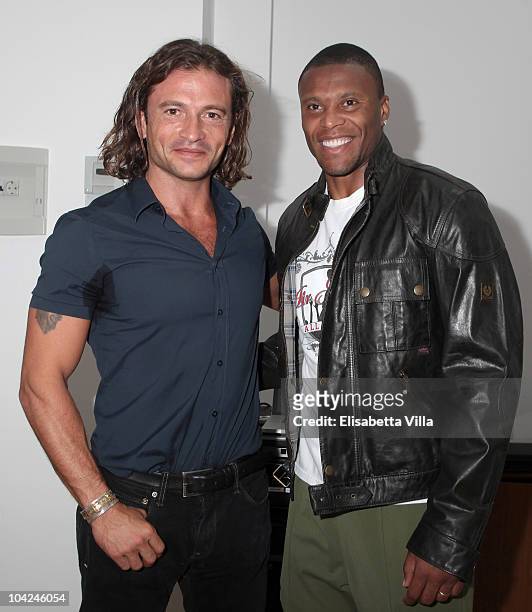Belstaff's Manuele Malenotti and AS Roma's football player Julio Cesar Baptista attend the Belstaff Official Meeting with AS Roma football team at...