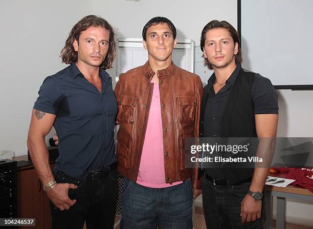 Manuele Malenotti, Nicolas Andres Burdisso and Michele Malenotti attend the Belstaff Official Meeting with AS Roma football team at the AS Roma...