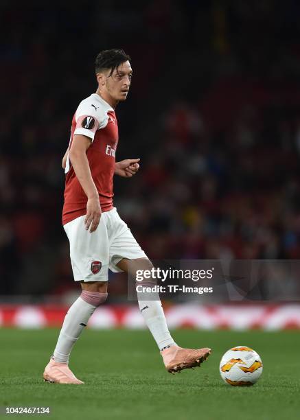 Mesut Ozil of Arsenal controls the ball during the UEFA Europa League Group E match between Arsenal and Vorskla Poltava at Emirates Stadium on...