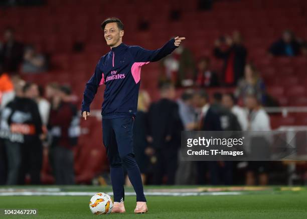 Mesut Ozil of Arsenal gestures during the UEFA Europa League Group E match between Arsenal and Vorskla Poltava at Emirates Stadium on September 20,...