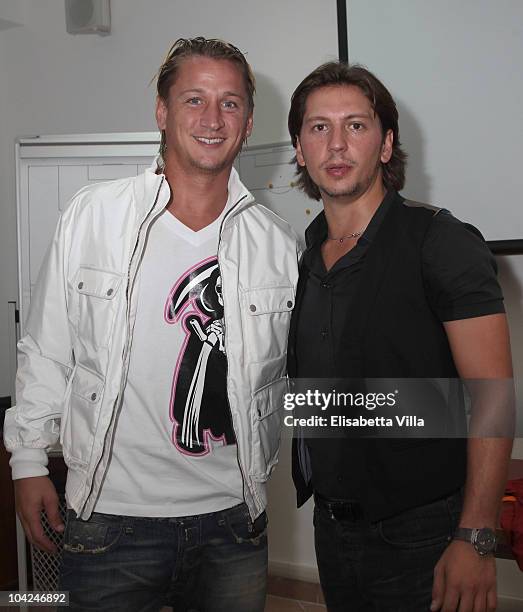 Belstaff's Michele Malenotti and AS Roma's football player Philippe Mexes attend the Belstaff Official Meeting with AS Roma football team at the AS...