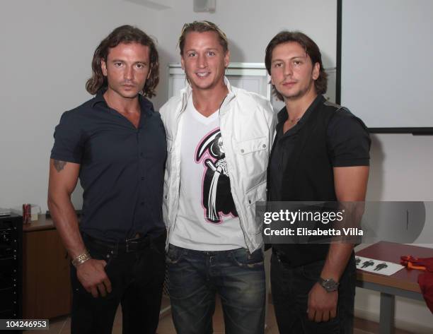 Manuele Malenotti, Philippe Mexes and Michele Malenotti attend the Belstaff Official Meeting with AS Roma football team at the AS Roma headquarters...