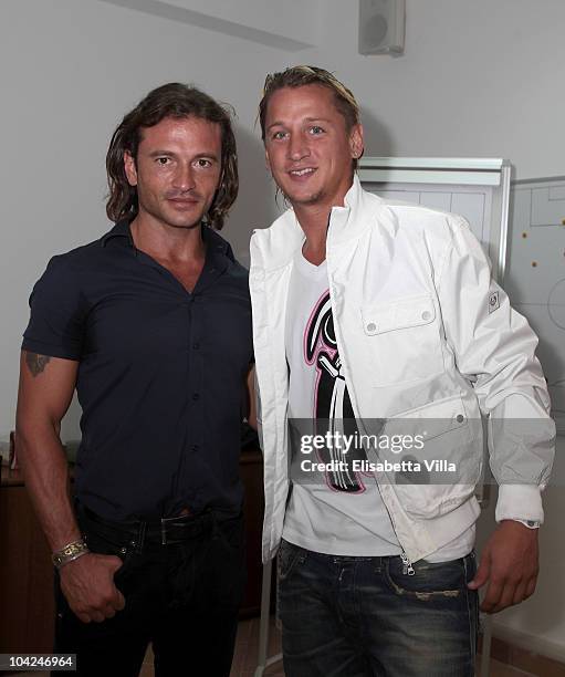 Belstaff's Manuele Malenotti and AS Roma's football player Philippe Mexes attend the Belstaff Official Meeting with AS Roma football team at the AS...