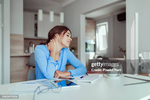 too many hours in front of the computer... - neck pain stock pictures, royalty-free photos & images