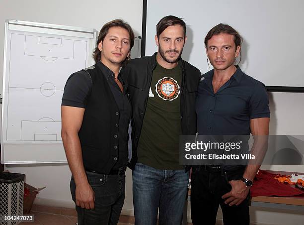 Manuele Malenotti, Marco Cassetti and Michele Malenotti attend the Belstaff Official Meeting with AS Roma football team at the AS Roma headquarters...