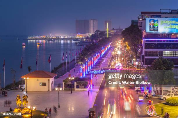 phnom penh, sisowath quay traffic, elevated view - phnom penh stock pictures, royalty-free photos & images