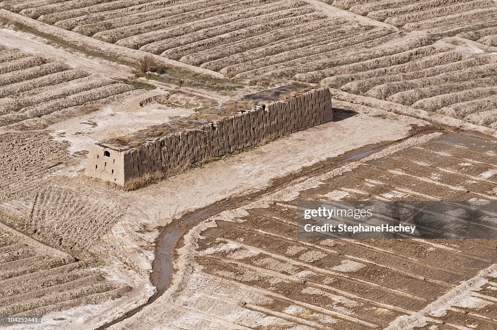 Aerial view of a grape hut and fields in Afghanistan