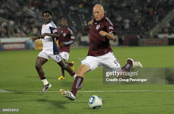 Conor Casey of the Colorado Rapids strikes the ball and scores in the 35th minute against the New England Revolution to give the Rapids a 2-0 lead at...