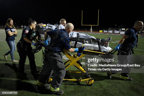 Freedom's Colby Hunter is transported off the field after sustaining an injury while playing against Antioch in the fourth quarter of their game at...