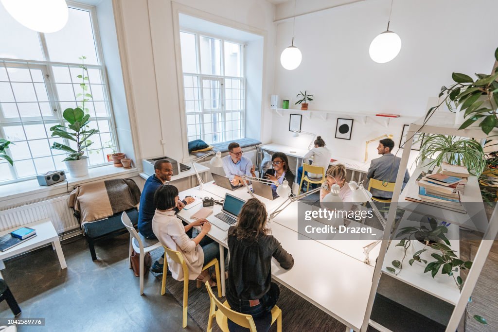 Modern business office with multi-ethnic team