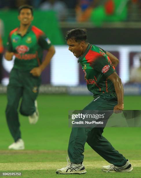 Bangladesh cricketer Rubel Hossain celebrates after taking a wicket during the final cricket match of Asia Cup 2018 between India and Bangladesh at...