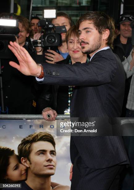 Zac Efron waves to fans during the premiere for "Charlie St Cloud" at the Parramatta Westfields store on September 19, 2010 in Sydney, Australia.