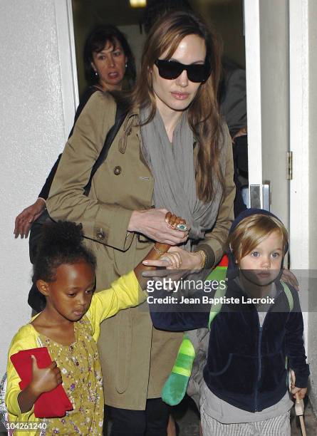 Angelina Jolie, Shiloh and Zahara arrive at LAX Airport on September 18, 2010 in Los Angeles, California.