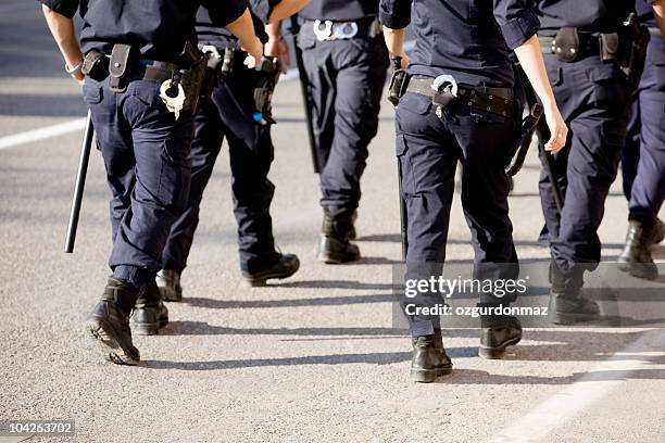 las fuerzas de policía - guardia de seguridad fotografías e imágenes de stock