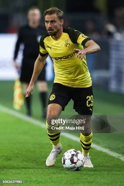 Marcel Schmelzer of Borussia Dortmund controls the ball during the Bundesliga match between Borussia Dortmund and 1. FC Nuernberg at Signal Iduna...