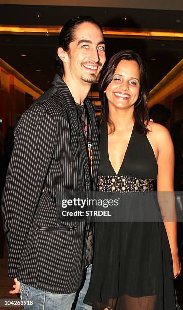 Indian bollywood actor Kabir Bedi�s son Adam Bedi stands with wife, model and actress Nisha Harale Bedi at Lakme Fashion Week winter/festive 2010 in...