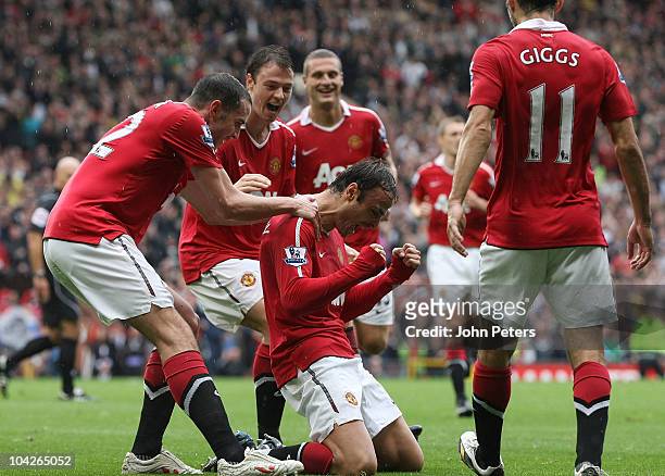 Dimitar Berbatov of Manchester United celebrates scoring their first goal during the Barclays Premier League match between Manchester United and...