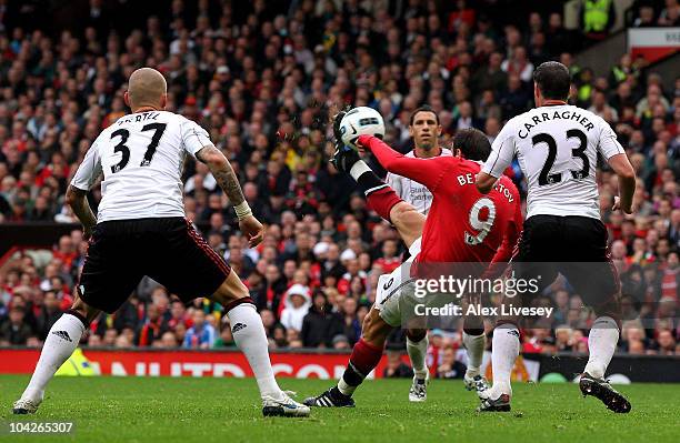 Dimitar Berbatov of Manchester United scores his team's second goal during the Barclays Premier League match between Manchester United and Liverpool...