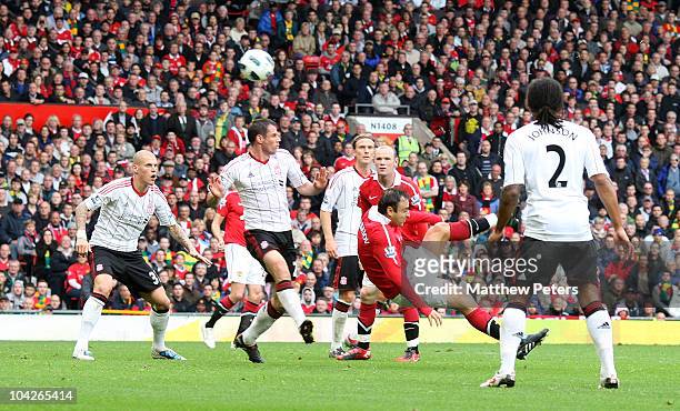 Dimitar Berbatov of Manchester United scores their second goal during the Barclays Premier League match between Manchester United and Liverpool at...