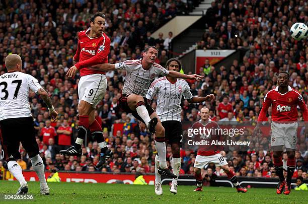 Dimitar Berbatov of Manchester United scores his team's third goal to complete his hat-trick during the Barclays Premier League match between...