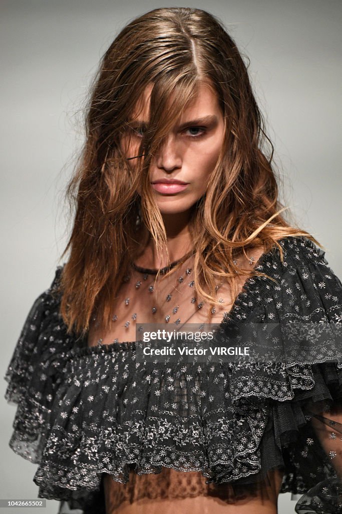 A model walks the runway at the Philosophy Di Lorenzo Serafini Ready