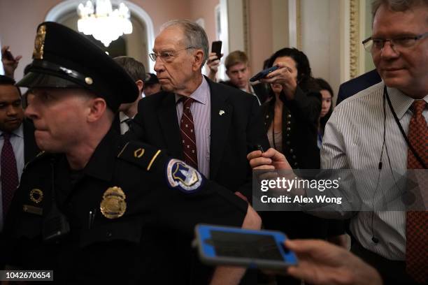 Sen. Chuck Grassley , chairman of Senate Judiciary Committee, leaves after a meeting in the office of Senate Majority Leader Sen. Mitch McConnell...