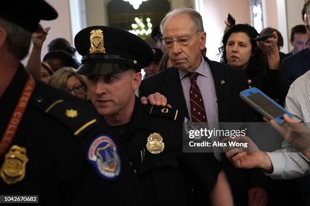 Sen. Chuck Grassley , chairman of Senate Judiciary Committee, leaves after a meeting in the office of Senate Majority Leader Sen. Mitch McConnell...