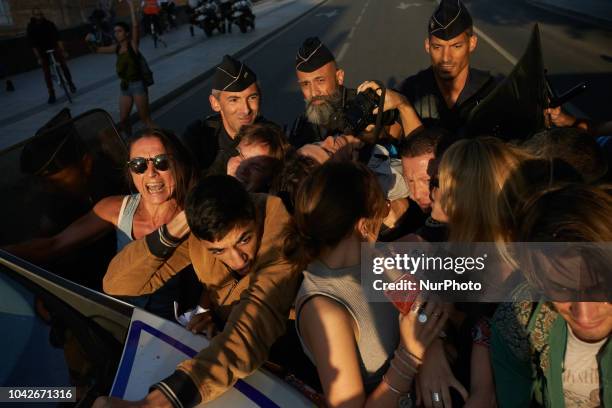 Scuffles occured between protesters and riot police as protesters wanted to go in the center of Toulosue. Women and men took to the streets of...