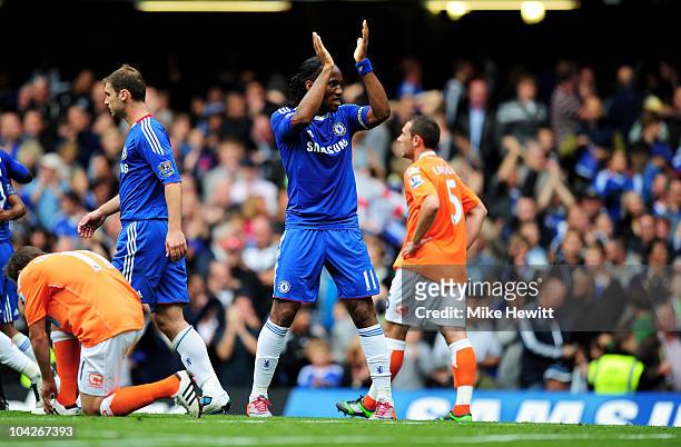 Didier Drogba of Chelsea celebrates after scoring his team's third goal during the Barclays Premier League match between Chelsea and Blackpool at...
