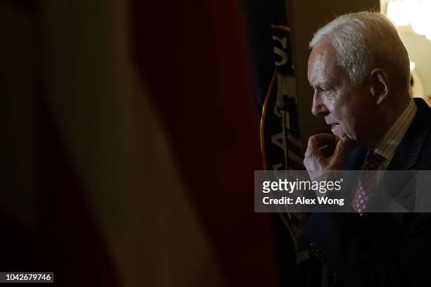 Sen. Orrin Hatch arrives at the office of Senate Majority Leader Sen. Mitch McConnell for a meeting after Senate Judiciary Committee voted to...