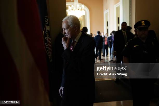 Sen. Orrin Hatch arrives at the office of Senate Majority Leader Sen. Mitch McConnell for a meeting after Senate Judiciary Committee voted to...
