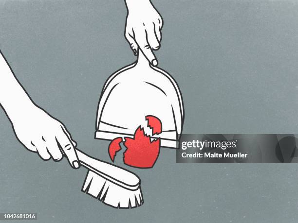 woman sweeping broken heart into dustpan - gebrochenes herz stock-fotos und bilder