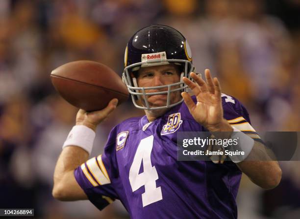 Quarterback Brett Favre of the Minnesota Vikings warms up prior to the start of the game against the Miami Dolphins on September 19, 2010 at Hubert...