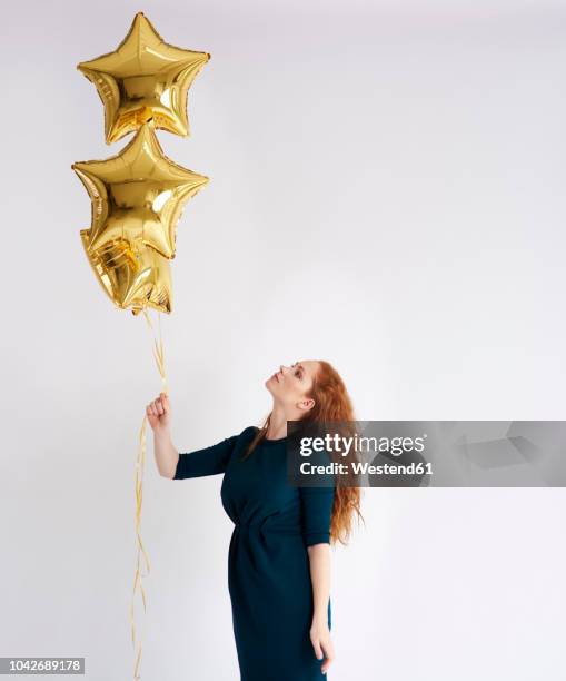 64 Balloon String Gold Stock Photos, High-Res Pictures, and Images - Getty  Images