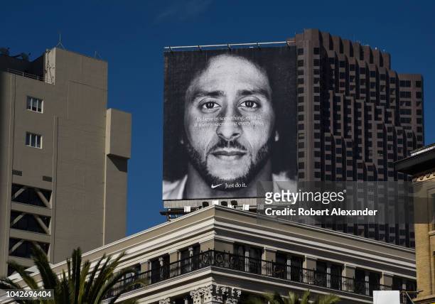 Billboard featuring a portrait of American NFL football player Colin Kaepernick mounted on top of a building in Union Square in San Francisco,...