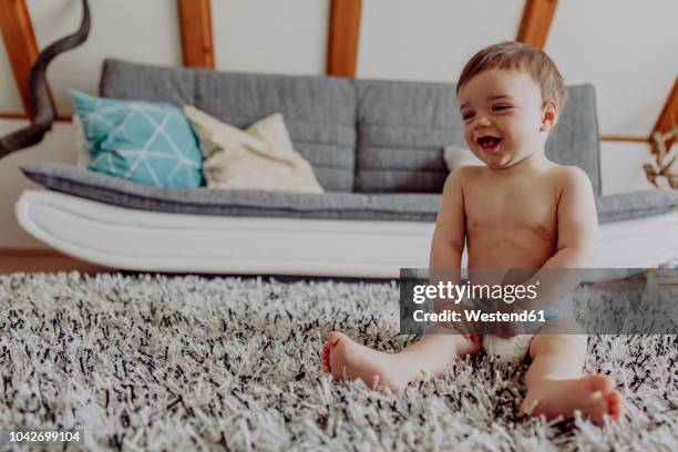 Baby On Rug 264 Baby Nappy Carpet Stock Photos, High-Res Pictures, and Images ...
