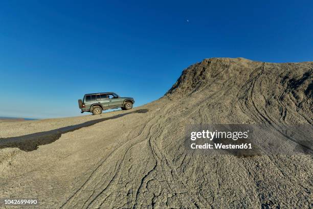 azerbaijan, gobustan, jeep at gobustan national park - off highway vehicle stock pictures, royalty-free photos & images
