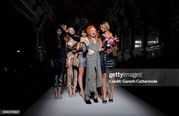 Daisy Lowe Vivienne Westwood and Jacquetta Wheeler walk the runway during the Vivienne Westwood Red Label Spring/Summer 2011 fashion show during LFW...